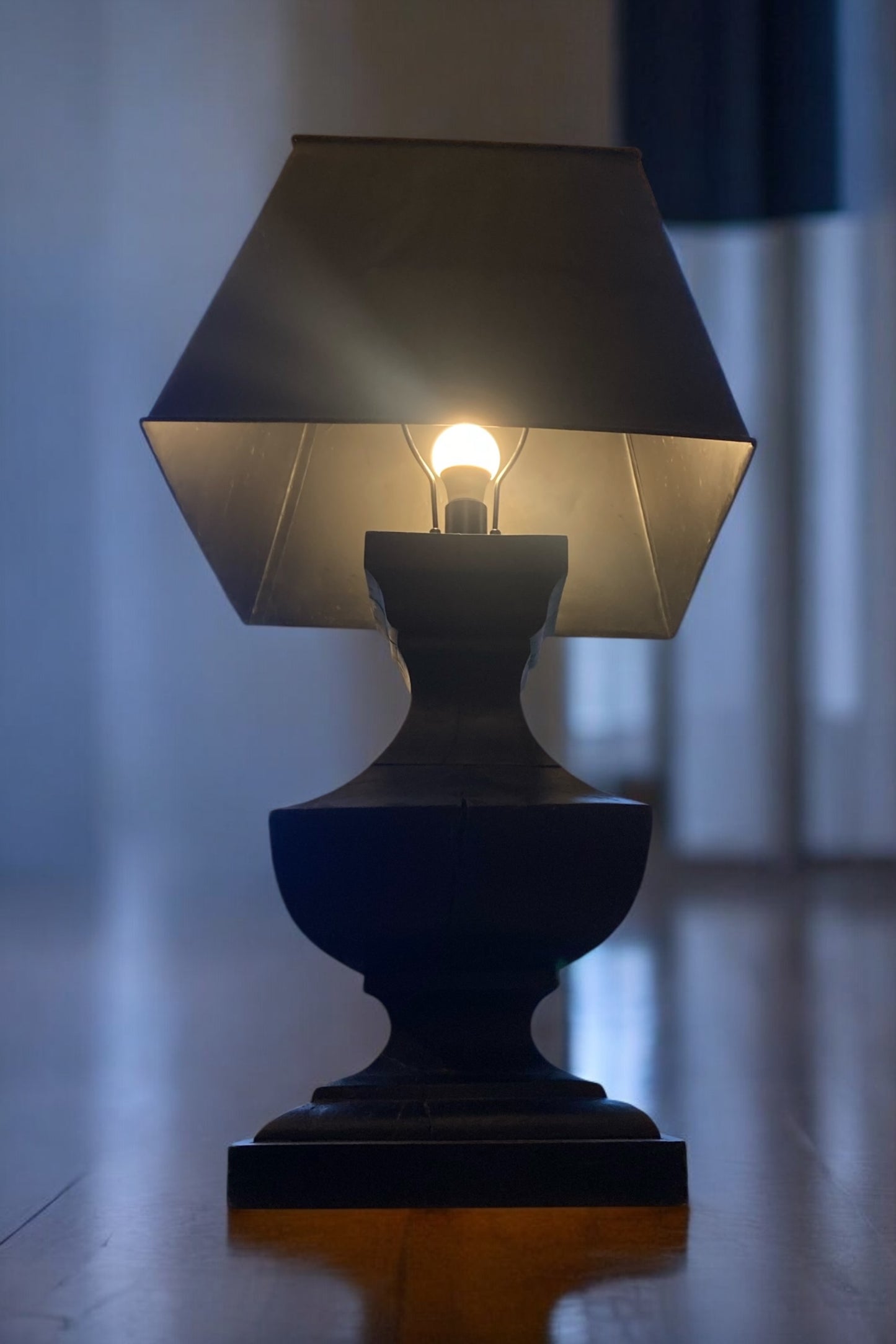 A Pair of Large French Hand Carved Table Lamps, Ebonsied Wood with Black Rustic Metal Shades