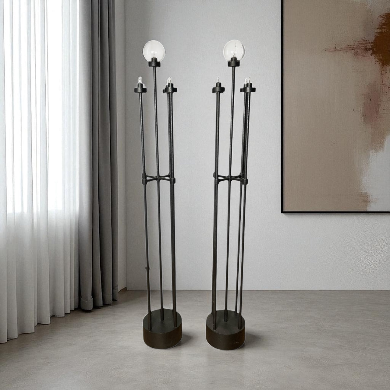 A pair of Italian metal floor lamps