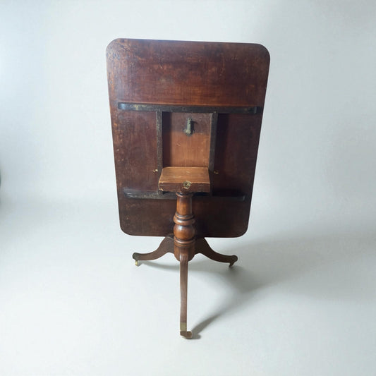 Georgian mahogany Tilt top table on brass castors