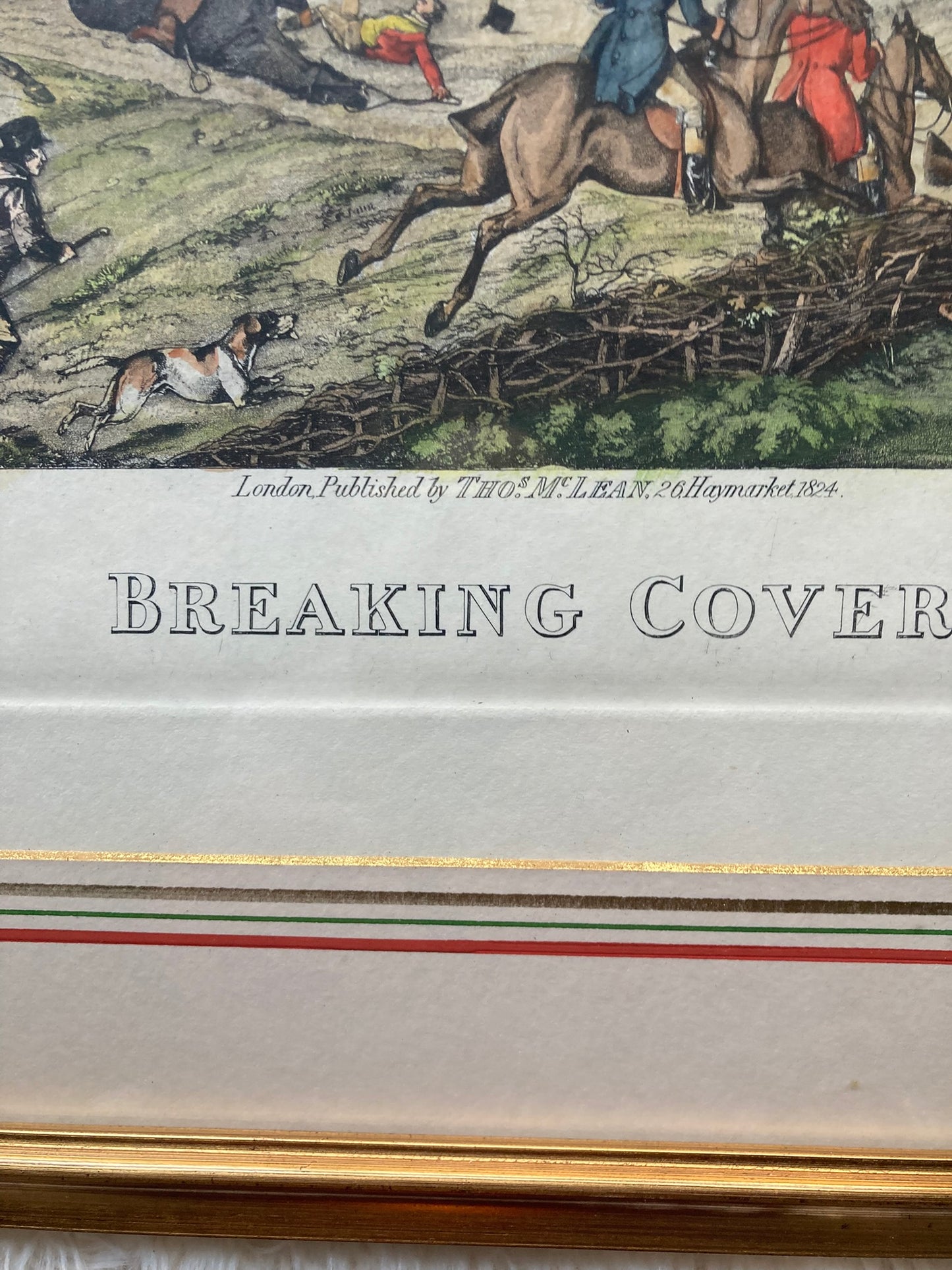 Framed print titled"Breaking Cover" a well-known fox hunting scene originally designed by the British artist Henry Thomas Alken.