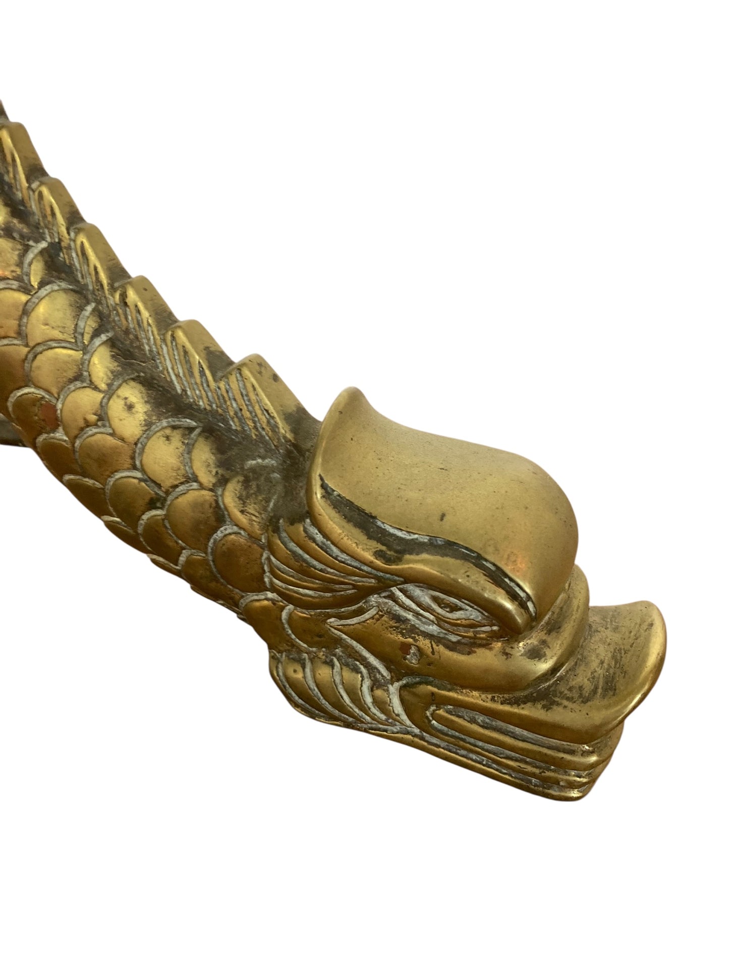 An antique brass jardinière or decorative planter