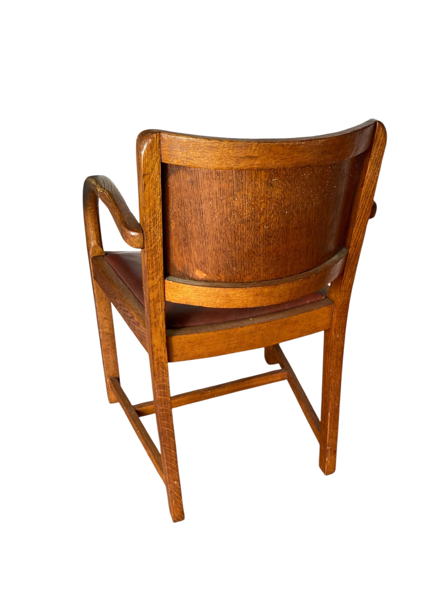 A vintage Art Deco-style armchair in the manner of Heals and Sons