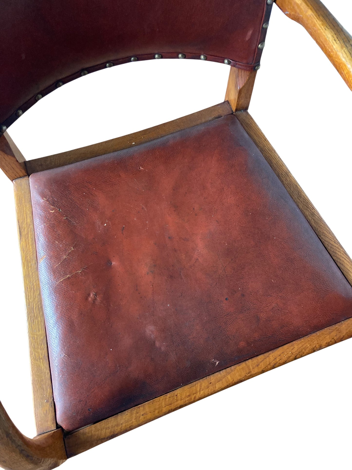 A vintage Art Deco-style armchair in the manner of Heals and Sons