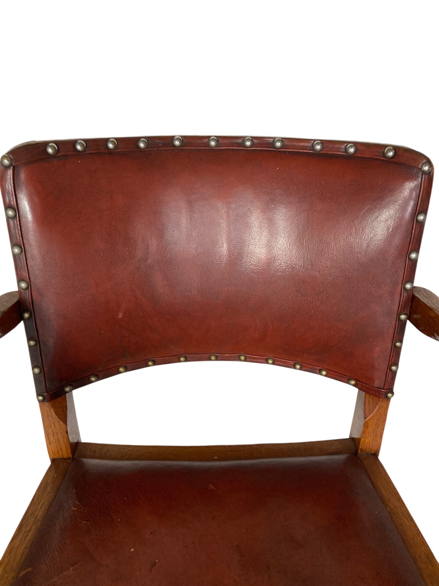 A vintage Art Deco-style armchair in the manner of Heals and Sons