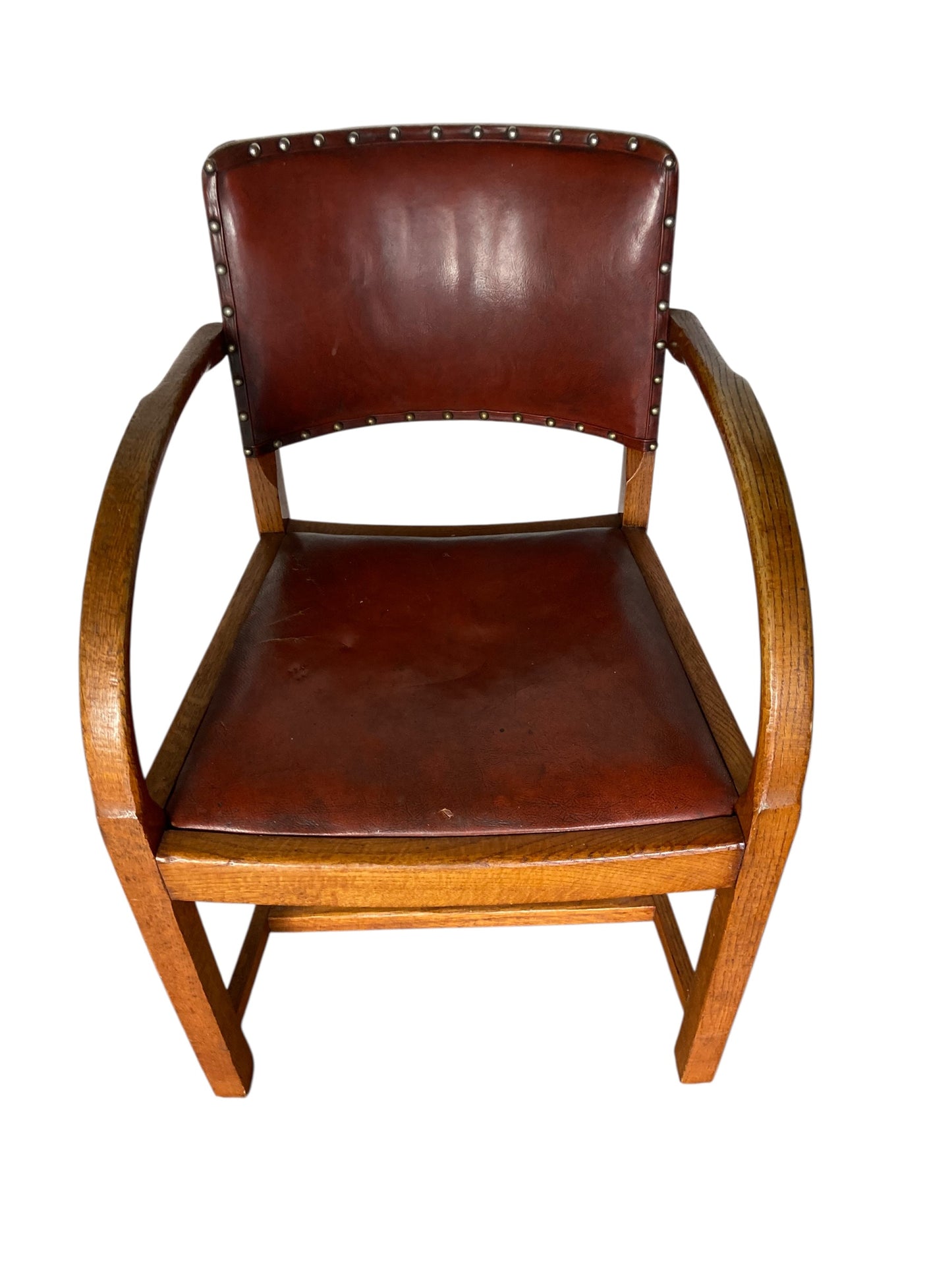 A vintage Art Deco-style armchair in the manner of Heals and Sons