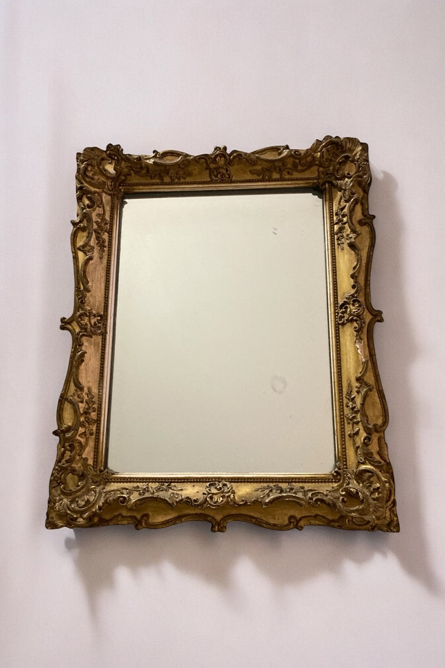 Rococo style gilt gesso rectangular wall mirror