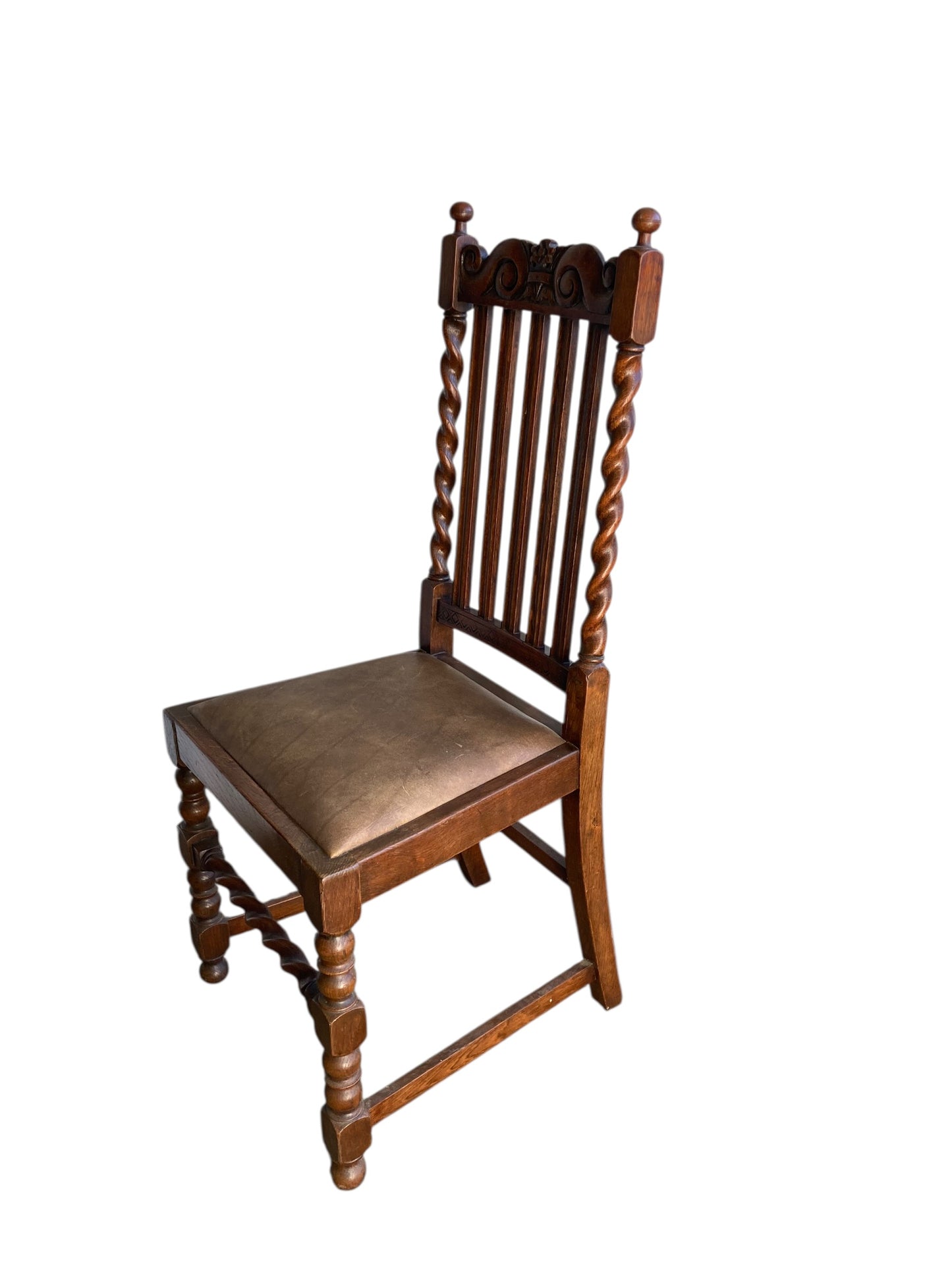 Pair of antique oak barley twist dining chairs dating from the late Victorian (c. 1880)to Edwardian (c. 1910–1920)eras.