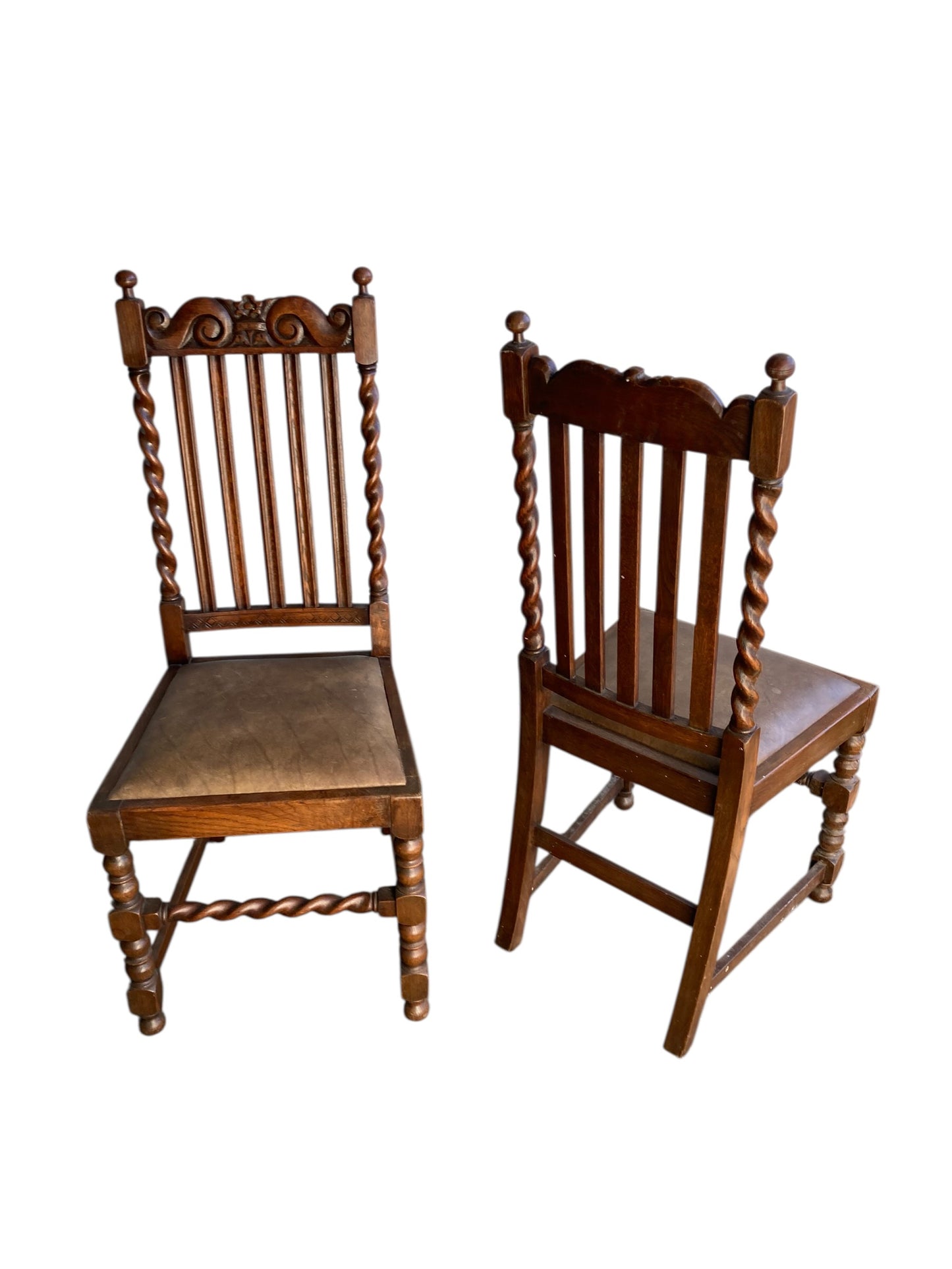 Pair of antique oak barley twist dining chairs dating from the late Victorian (c. 1880)to Edwardian (c. 1910–1920)eras.