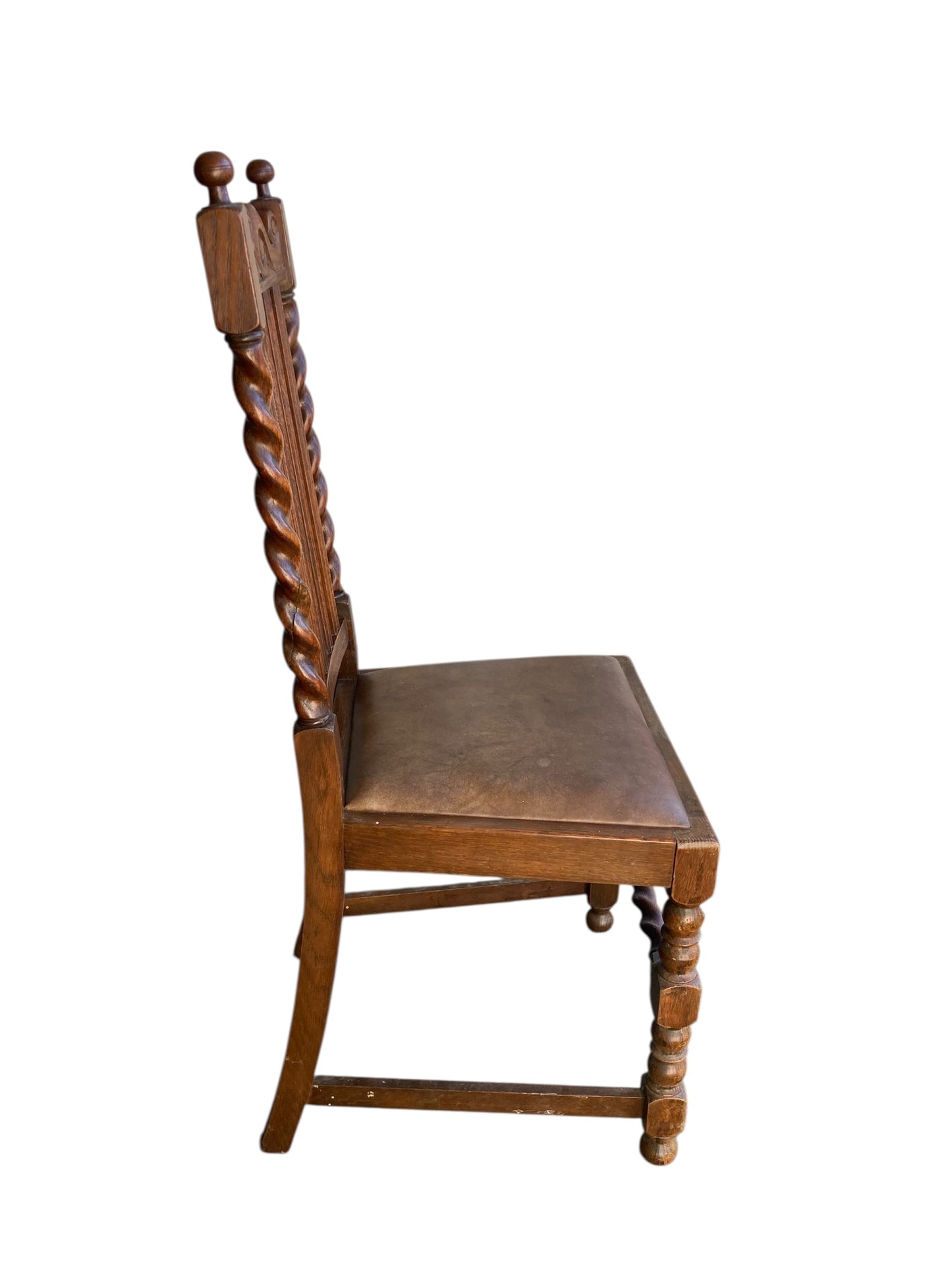 Pair of antique oak barley twist dining chairs dating from the late Victorian (c. 1880)to Edwardian (c. 1910–1920)eras.