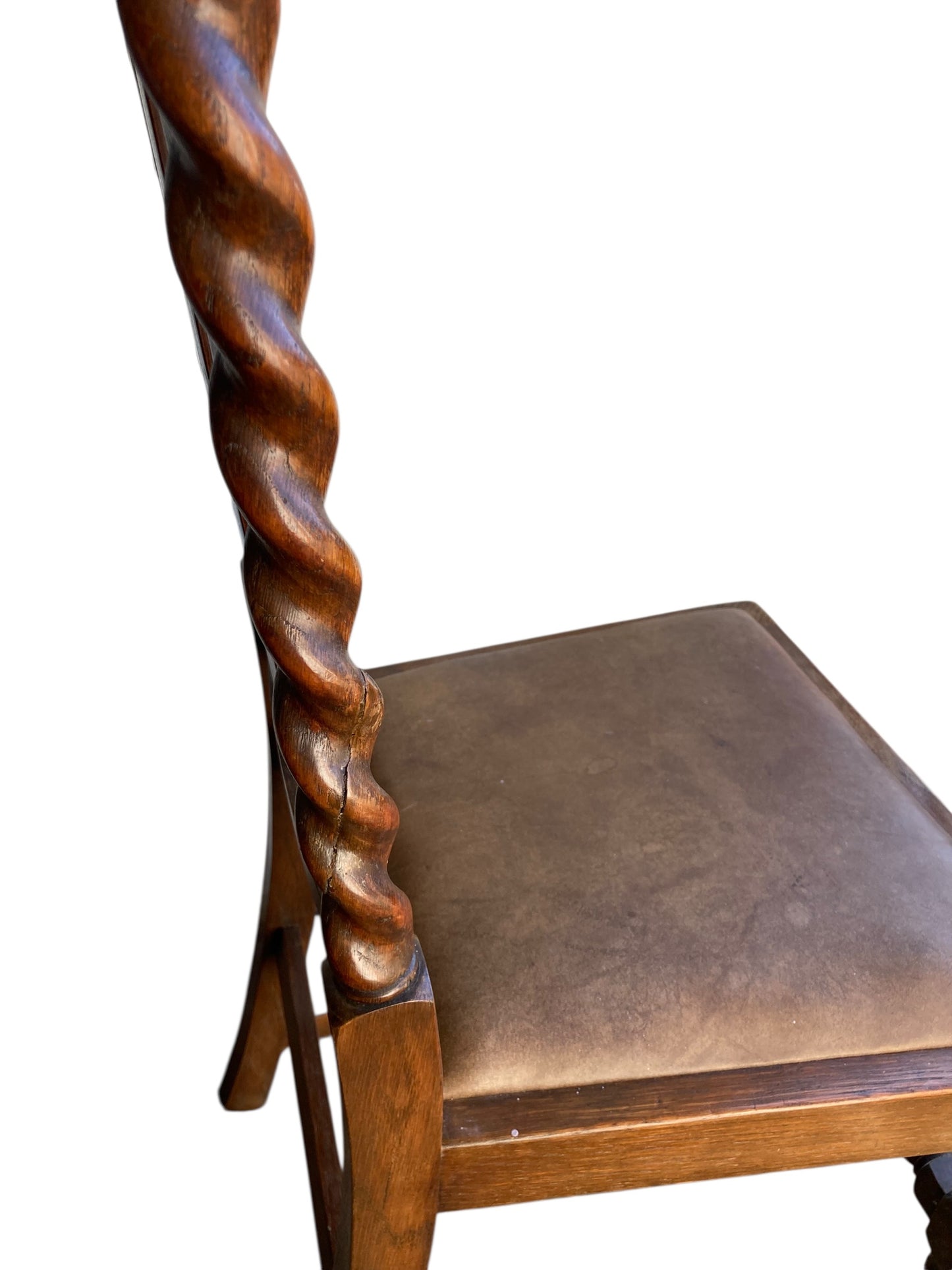 Pair of antique oak barley twist dining chairs dating from the late Victorian (c. 1880)to Edwardian (c. 1910–1920)eras.