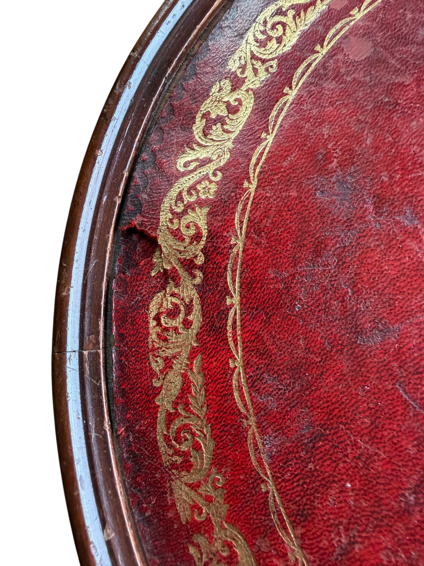 Antique-style tripod pedestal wine table featuring a circular top with a distinctive red leather inset.