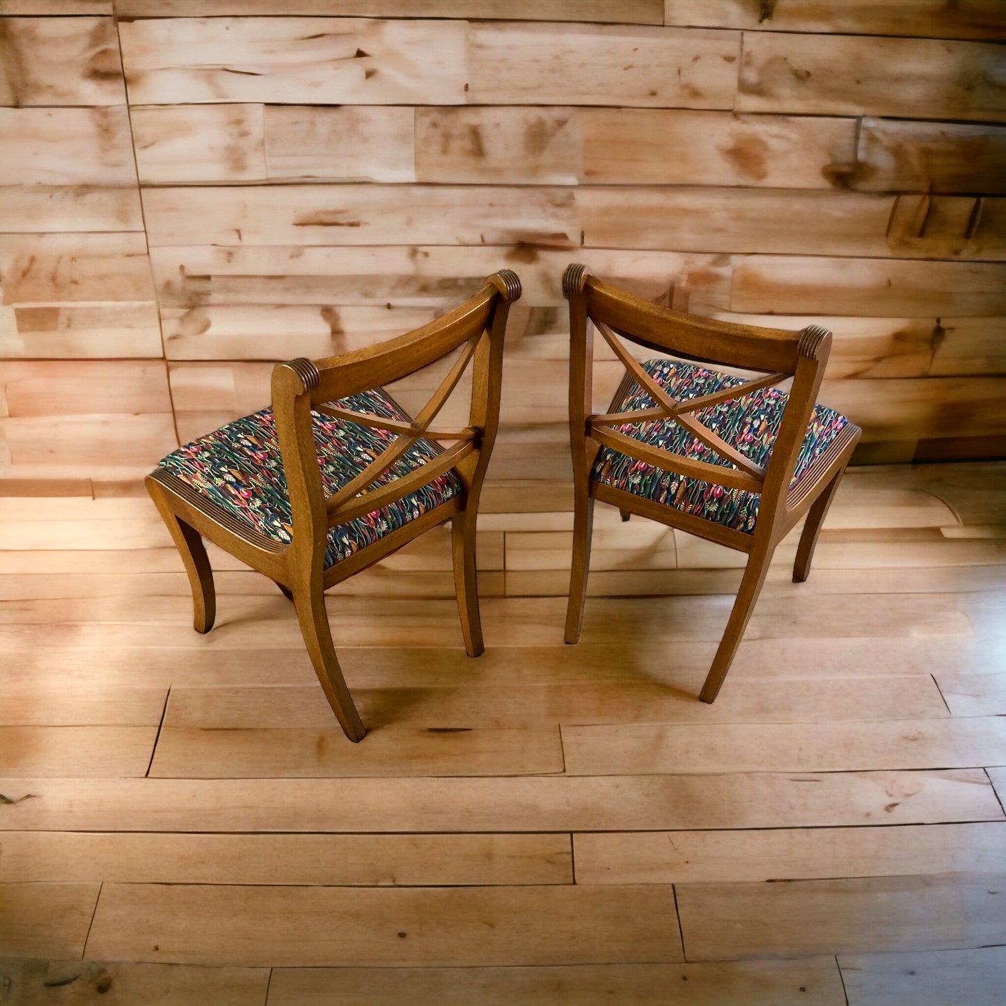 A pair of Regency Cross Stick Chairs