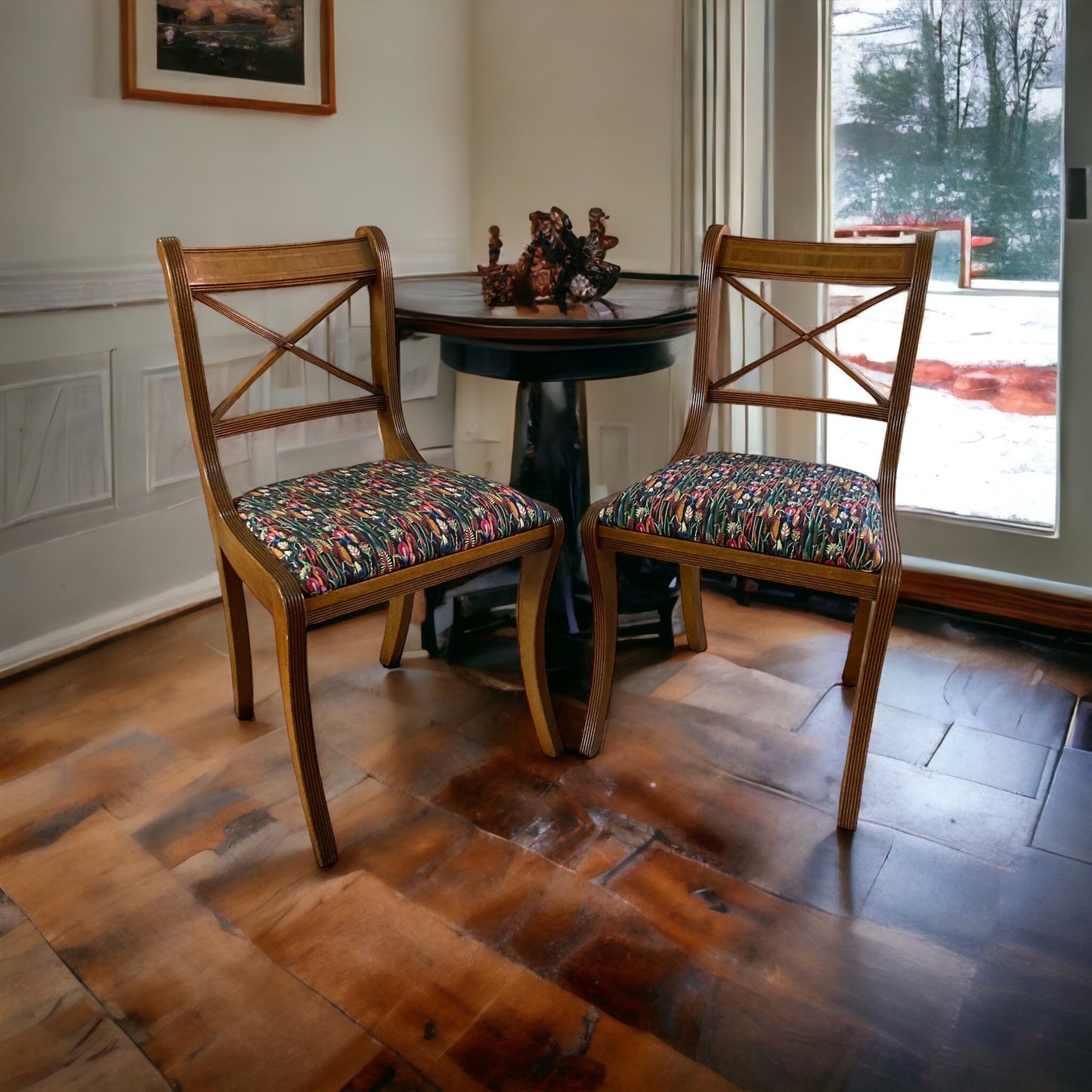 A pair of Regency Cross Stick Chairs