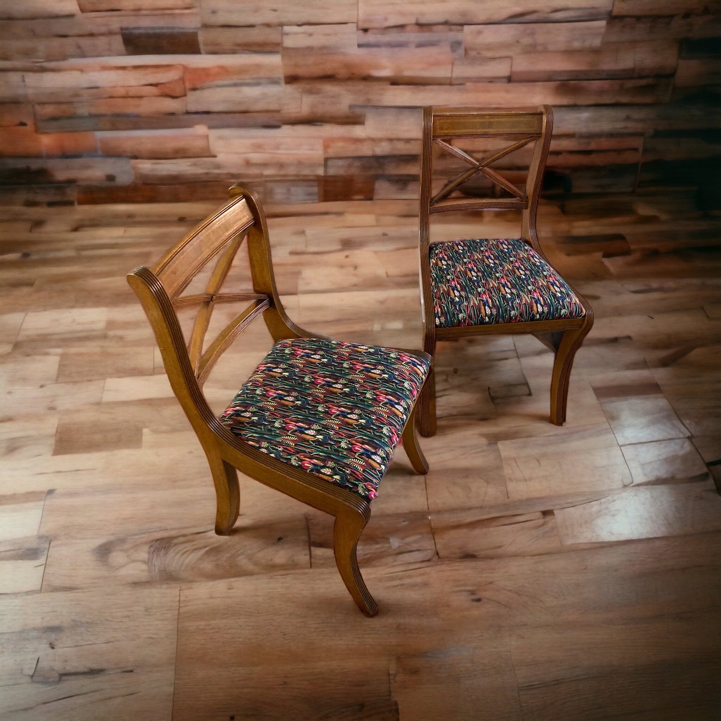 A pair of Regency Cross Stick Chairs