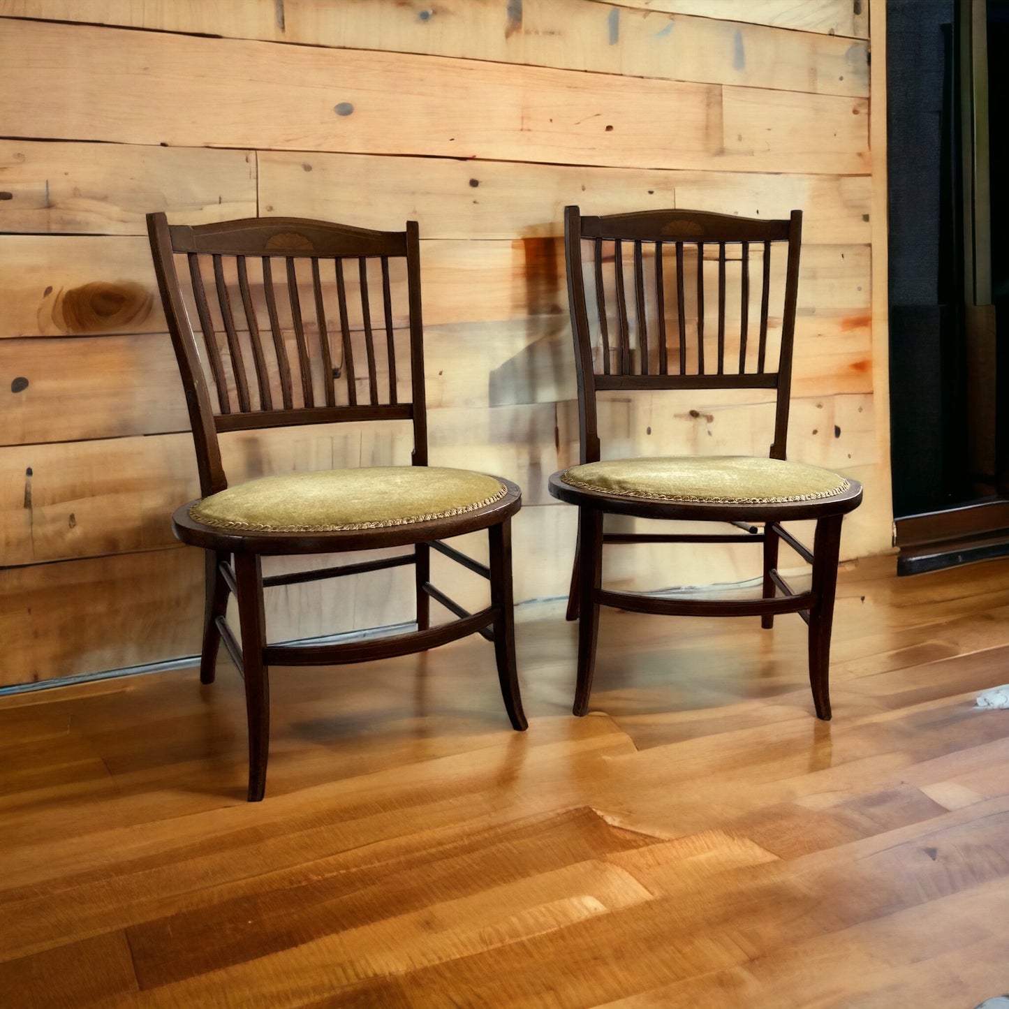 A pair of Edwardian Antique Mahogany Oval based hall chairs