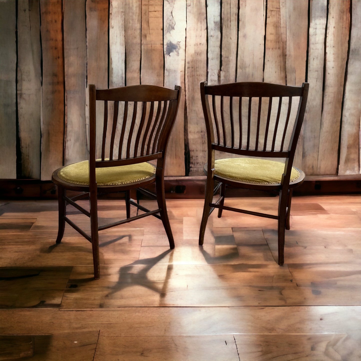 A pair of Edwardian Antique Mahogany Oval based hall chairs