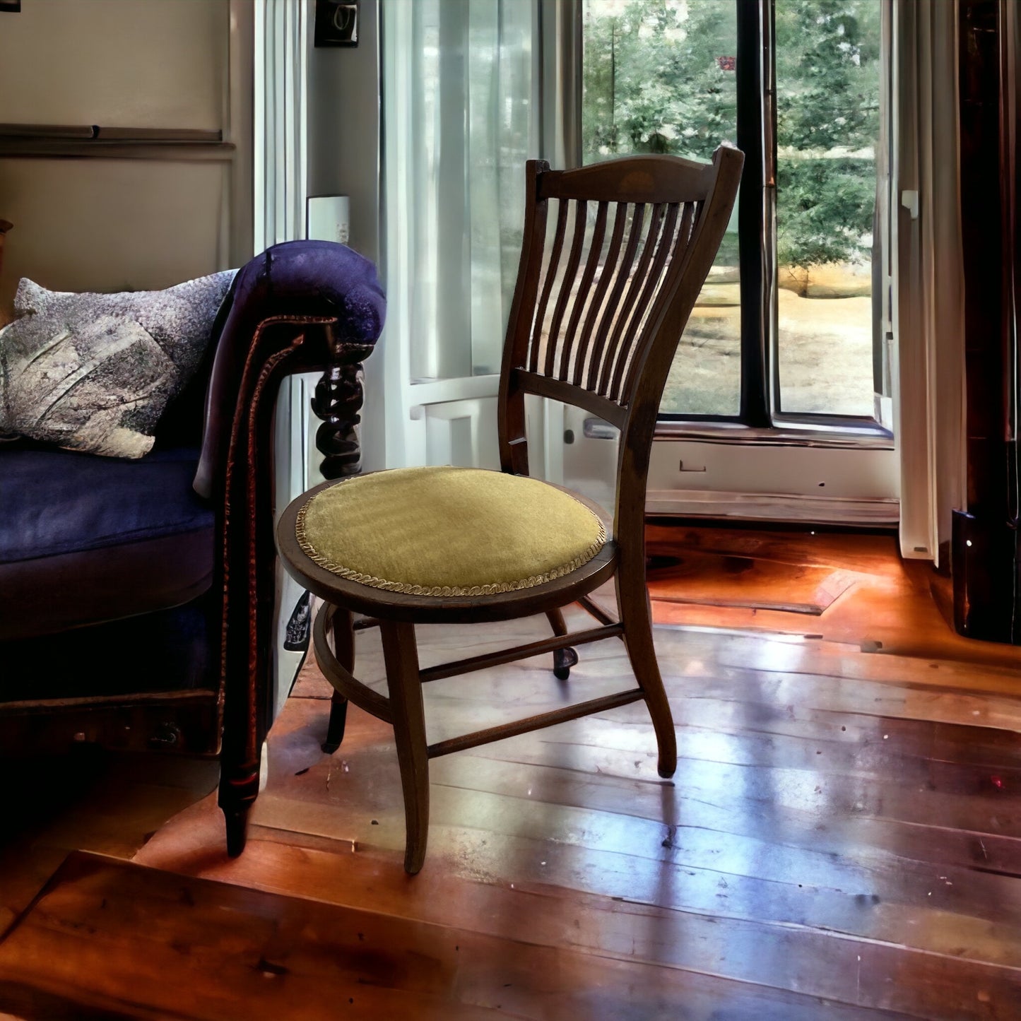 A pair of Edwardian Antique Mahogany Oval based hall chairs