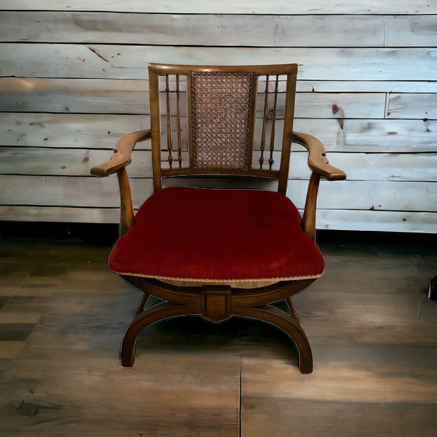 A rare Antique Beech Wood X Framed Cane back Arm chair