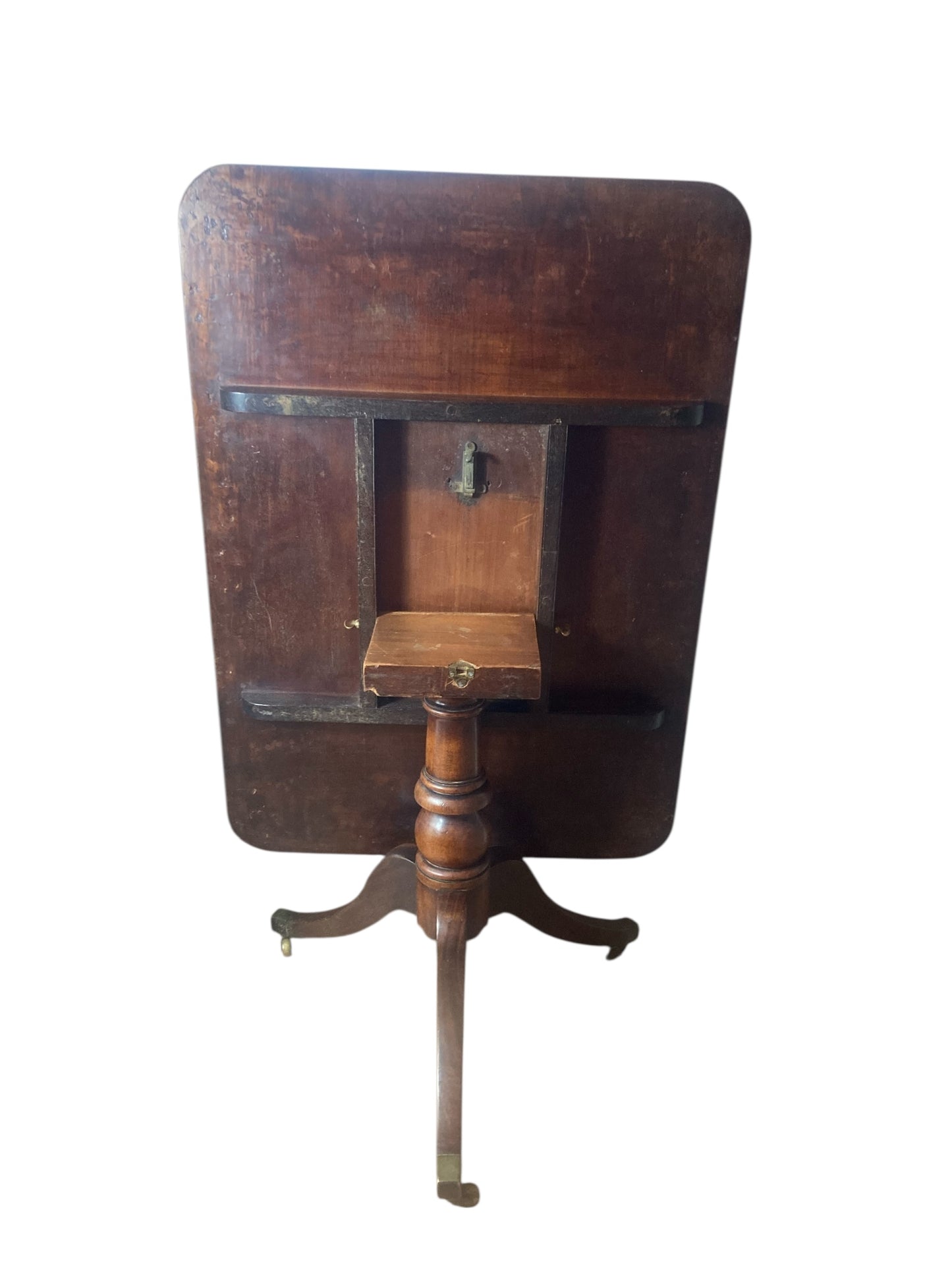 Georgian mahogany Tilt top table on brass castors