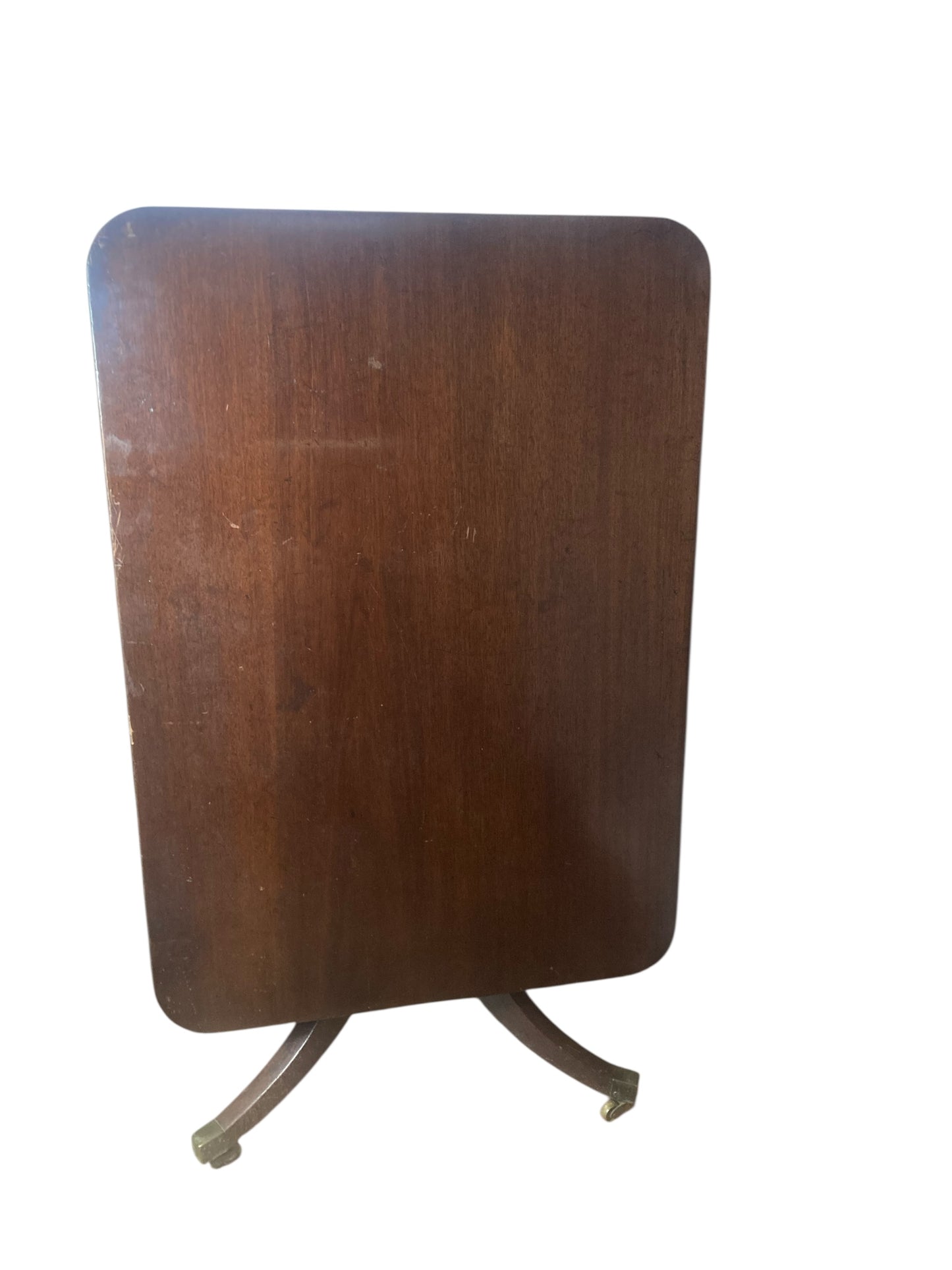 Georgian mahogany Tilt top table on brass castors