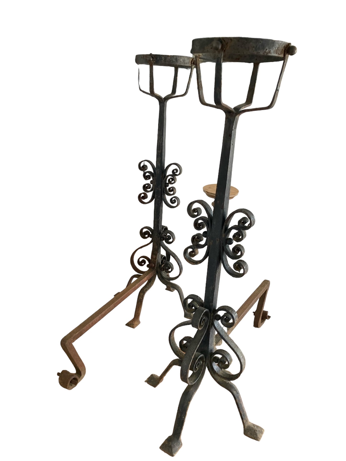 A pair of Large French Wrought Iron Fire Dogs with large fire baskets