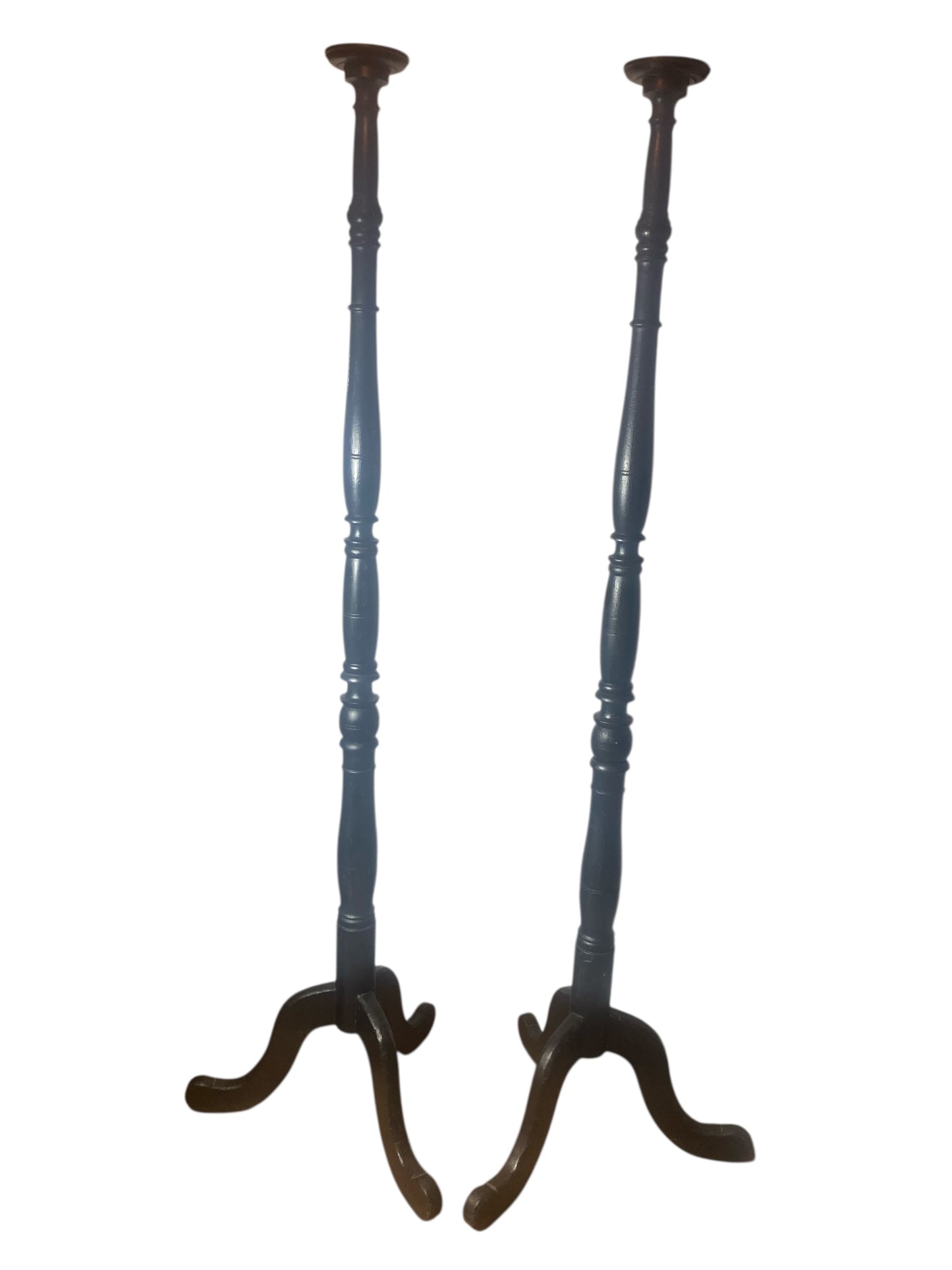 A pair of Tall Ebonised Tri Leg Torcheres