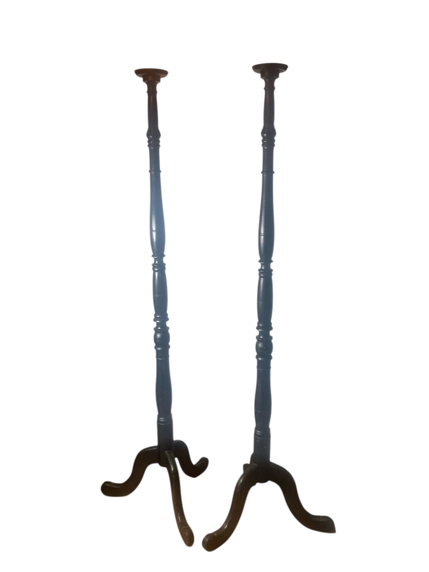A pair of Tall Ebonised Tri Leg Torcheres