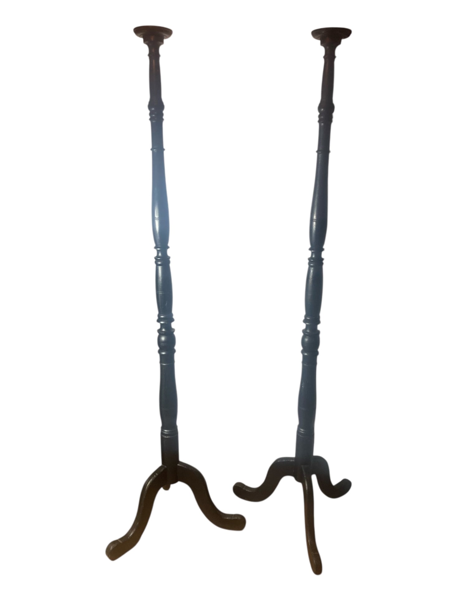 A pair of Tall Ebonised Tri Leg Torcheres