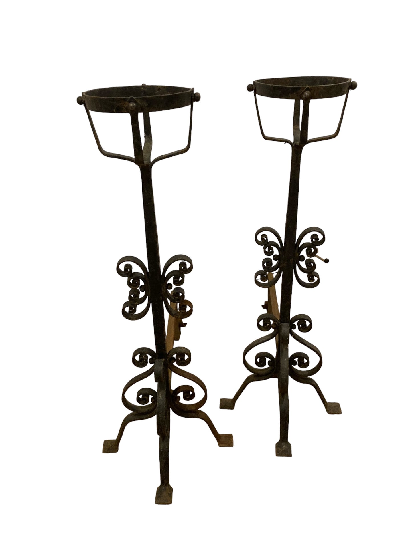 A pair of Large French Wrought Iron Fire Dogs with large fire baskets