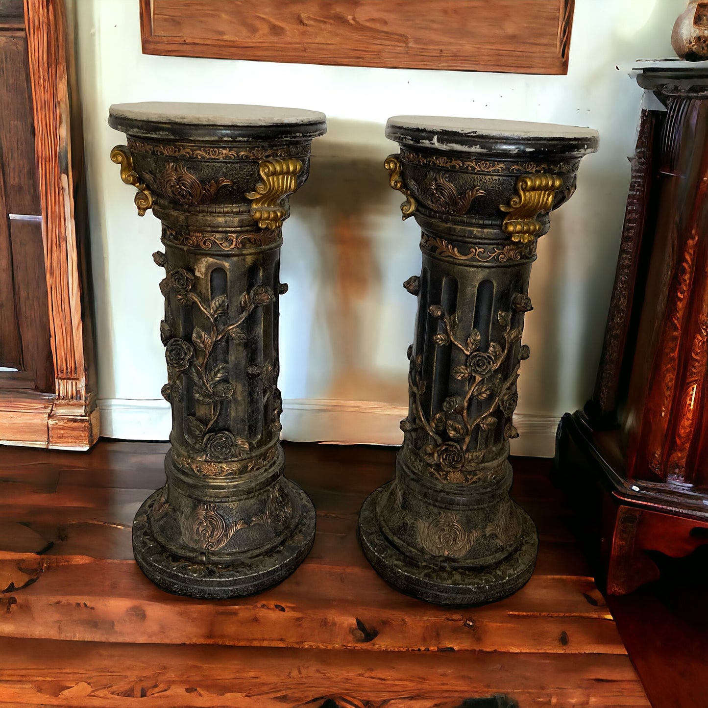 Pair of highly carved Ebonised Pedestals, Rose vine detail, Gilt deco, White marble top