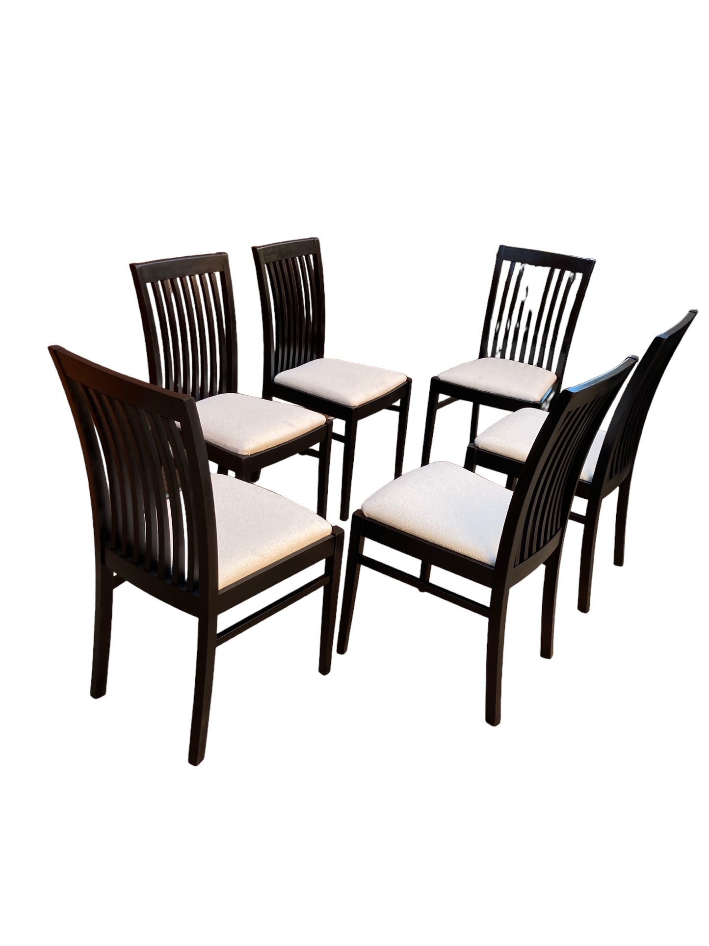 A set of 6 Italian Sedi Friuli dining chairs finished in gloss black with cream Boucle upholstery