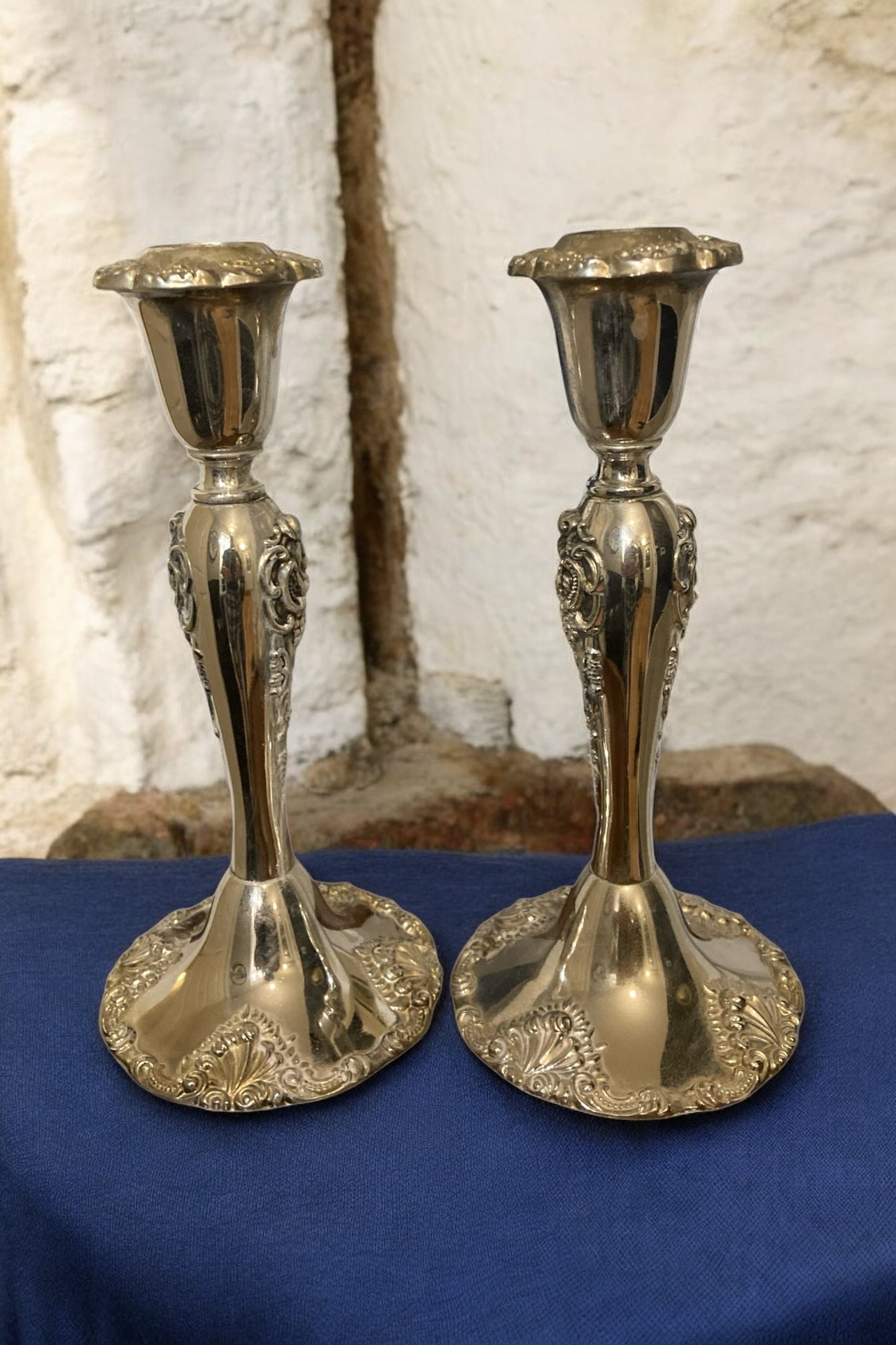 A pair of Silver Plated Godinger Baroque Style Candle holders