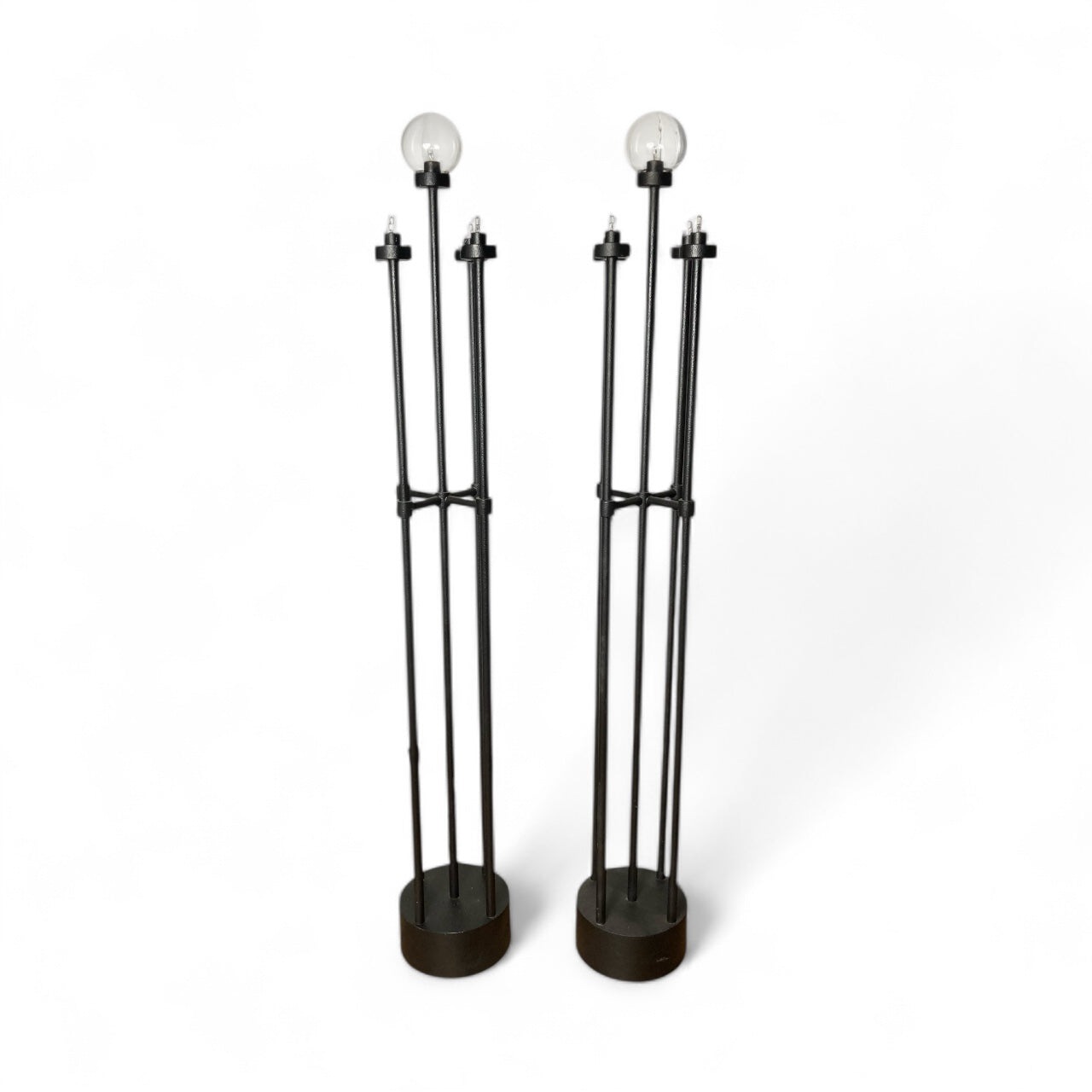A pair of Italian metal floor lamps