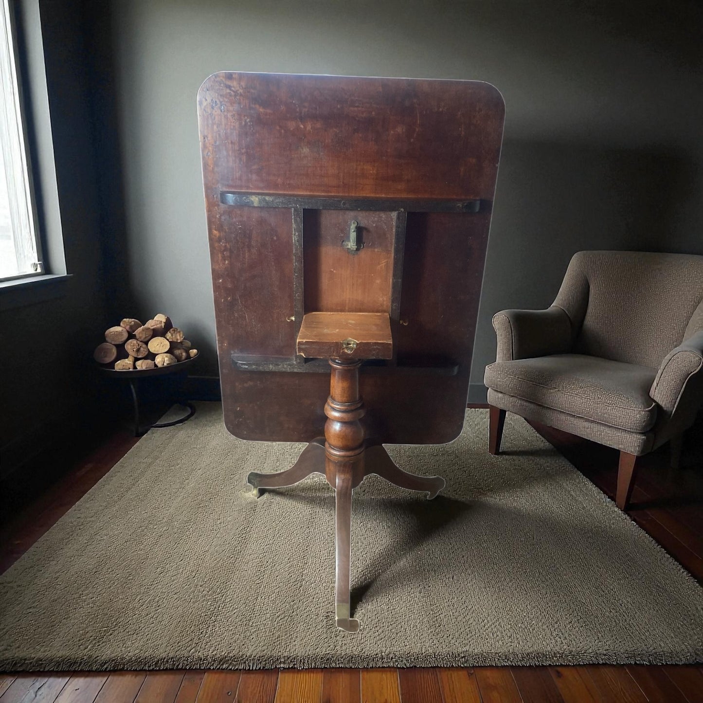 Georgian mahogany Tilt top table on brass castors