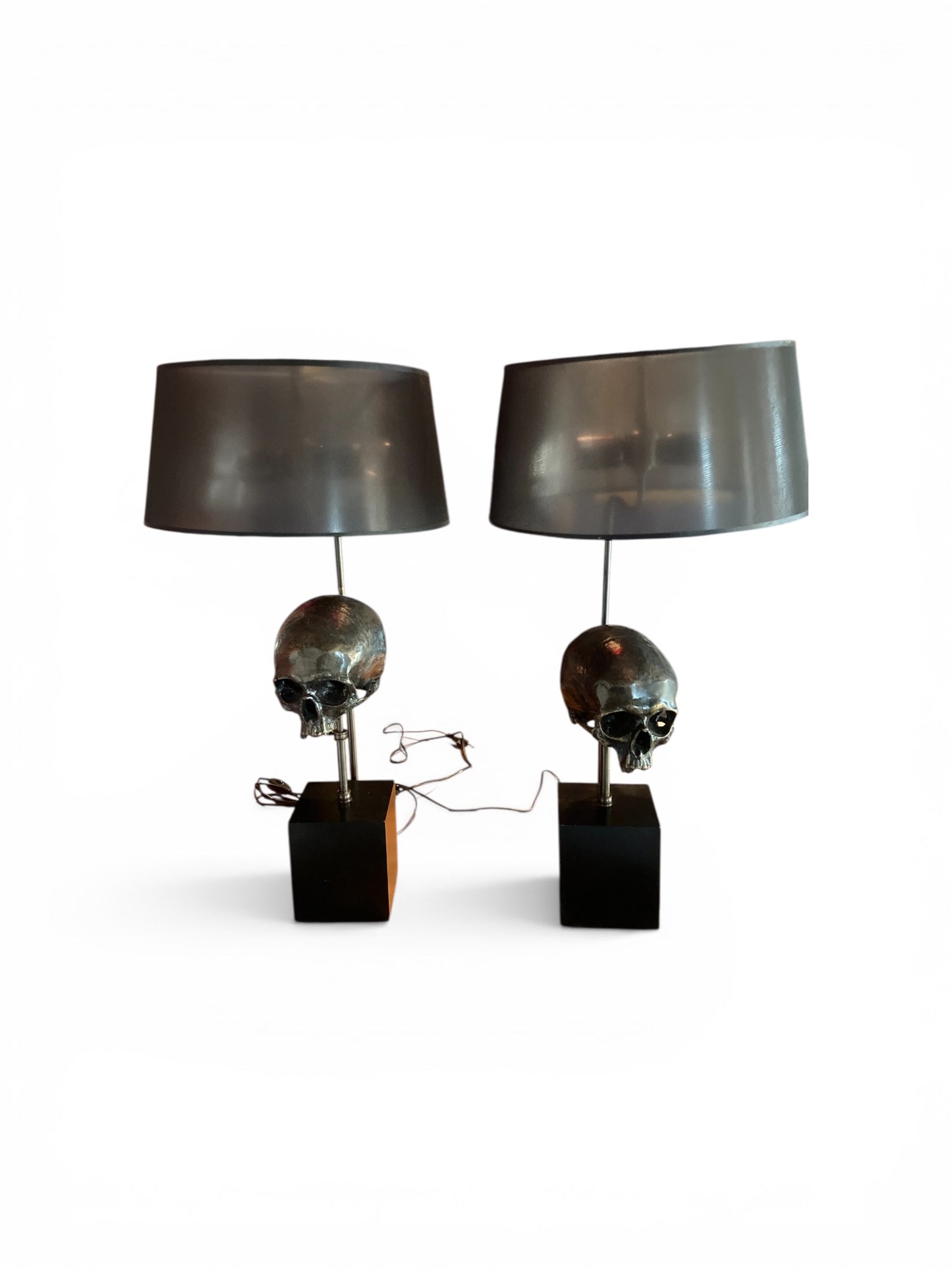 Extruder Skull Table Lamps designed by the luxury brand Eichholtz