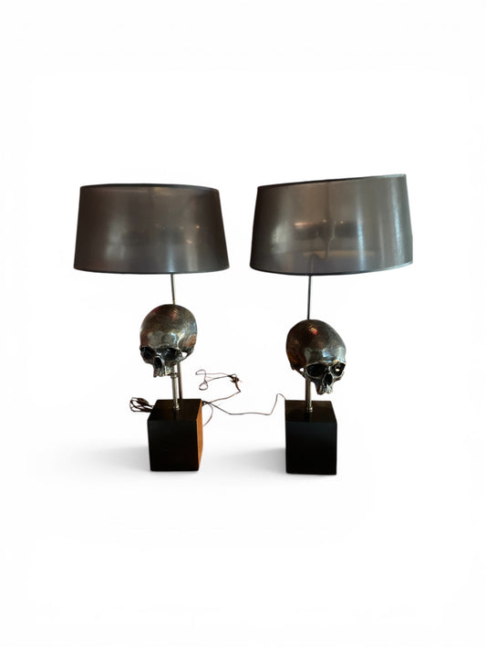Extruder Skull Table Lamps designed by the luxury brand Eichholtz