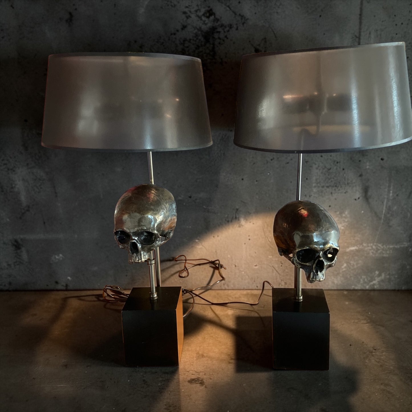 Extruder Skull Table Lamps designed by the luxury brand Eichholtz