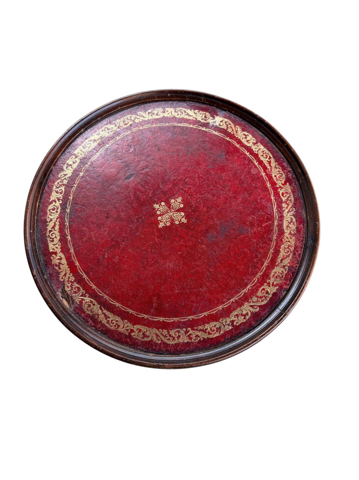 Antique-style tripod pedestal wine table featuring a circular top with a distinctive red leather inset.